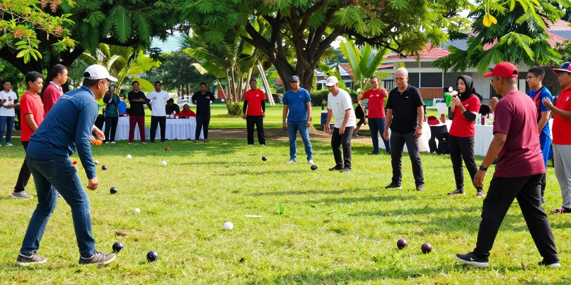 Players engaged in a lively petanque match at fopikotaparepare.org, showcasing community spirit in the lush Parepare park.